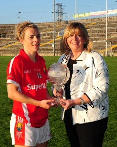Valerie Mulcahy recieves the player of the match award from Marie Hickey LGFA National President